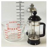 Pyrex measuring cup, coffee press and milk frother