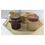 Stonewear crocks with lids, small pitcher, and a