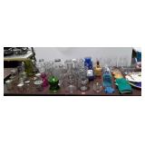 Group lot of glassware, includes vases, jars,