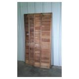 Four louvered bifold style doors, some wear as