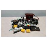 Small group of camera parts and pieces.