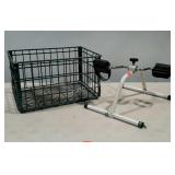 Metal milk crate and a pedal exerciser.