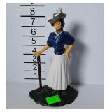 Cast iron door stop, lady golfer design
