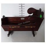 Small doll cradle with floral decals, 12" long