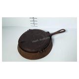 Cast iron waffle iron with handled base, marked 8