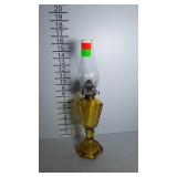 Amber glass oil lamp with clear glass chimney