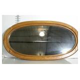 Oak, oval wall mirror. 35"×19".