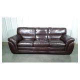 Sofa. Nice Brown quality pleather made sofa. From