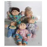 Five Cabbage Patch Dolls, 1990s one 2002 dated.