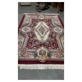 Wool Room Rug, Rose Medallion pattern, has a