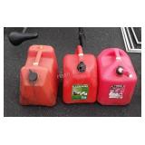 Three fuel cans