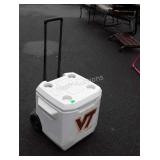 Coleman cooler on wheels, with adjustable handle