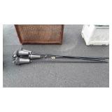 Group of four plastic tiki torches