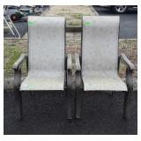Group of four patio chairs