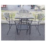Wrought Iron patio table set is 28 by 28 by 29
