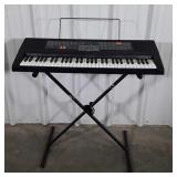 Casio Electronic Keyboard on stand, model