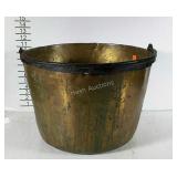 Large iron and brass kettle with swing handle.