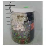 Legacy marble collection in jar with booklet, and