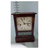 Key wind shelf clock with key & pendulum, missing
