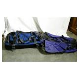 Two rolling duffel bags.