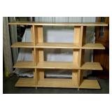 Open shelving. Inch thick boards. Not screwed