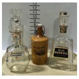 5 Collectible liquor bottles - four glass and one