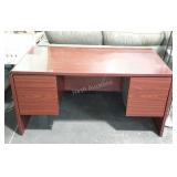 Laminated office desk. Shows wear. 60"×30"×29".