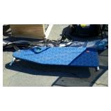 Ironing board and a set of skis