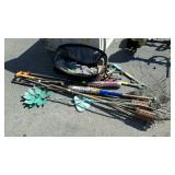 Misc lot with baseball bat, tiki torches, lawn