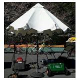 Patio umbrella with stand