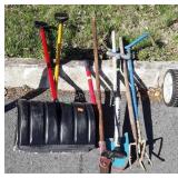 Group of long handled tools, includes garden