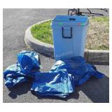 Blue trashcan no lid with six tarps