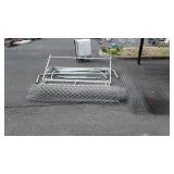 Two partial rolls of fencing and parts to dog