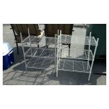 Pair of laundry room shelving, one is Chrome