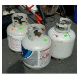Three empty propane tanks seller code 26