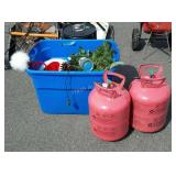 Tote with empty helium tanks and artificial