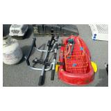 Group lot with child sled, exerciser, sprinkler
