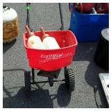 Earthway spreader and two baby calves bottles