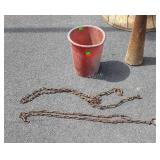 Red bucket with small chains