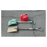 Two shovels and a gas can