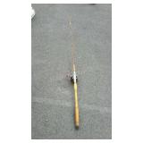 Wooden handle fishing pole