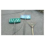 Two snow shovels and one leaf rake