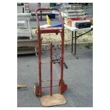 Red four wheeled hand cart