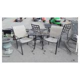 Three pc patio set, table is 28 by 29 inches tall