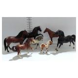 Bryer horses, 7 total, three varying sizes.