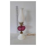 Cranberry glass lamp with milk glass base and