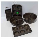Tin ware - cake pans, muffin tins, and grater