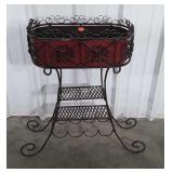 Plantstand. Iron stand with wine bottle holder