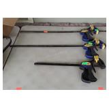three Irwin quick grip clamps