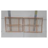 Two wooden baby safety gates